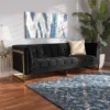 Baxton Studio Ambra Glam and Luxe Black Velvet Upholstered and Button Tufted Sofa with Gold-Tone Frame